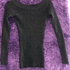 Tight black sparkly off the shoulder long shirt